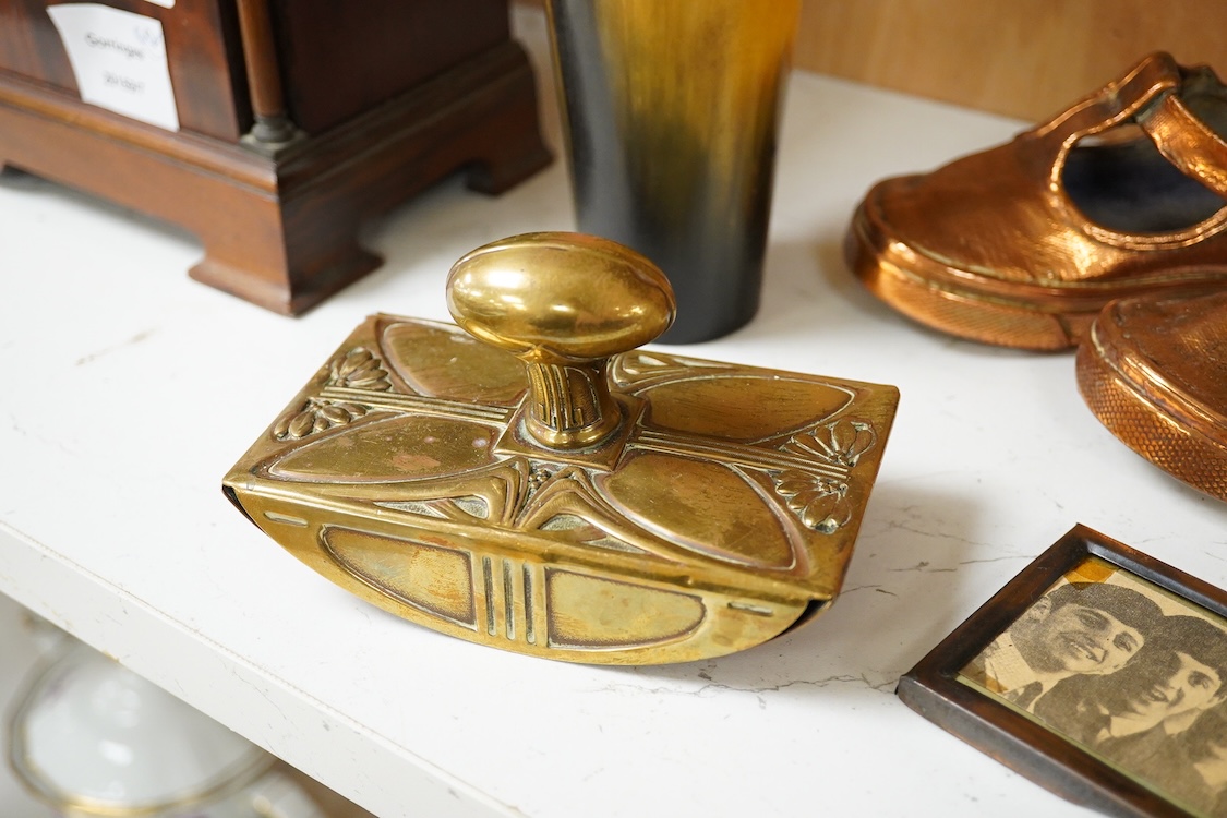 A collection of mixed metalware to include a copper plaque and brass ink blotter, together with a horn beaker